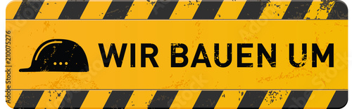 Cuadros en Lienzo gelbes Schild Wir bauenn um mit Helm-Icon