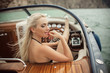 © _chupacabra_ - Beautiful young blonde girl is wearing sexy fashion swimsuit doing summer trip on a yacht