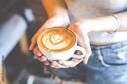 Cup of coffee with beautiful Latte art Tableau sur Toile
