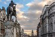 View from Trafalgar Square on the back of the Renaissance-style equestrian statue of Charles I on horseback looking down Whitehall towards Big Ben, Westminster, London.