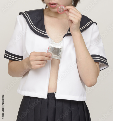 コンドームを持つ女子高校生 Buy This Stock Photo And Explore Similar Images At Adobe Stock Adobe Stock