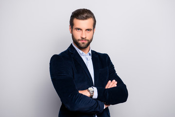 Portrait of cool handsome attractive virile masculine elegant classy elegant stunning dressed in dark blue velvet blazer checkered shirt standing with crossed arms isolated gray background copy-space