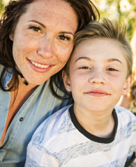 Wall Mural - Mother spending time with son during the sunset.