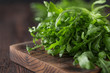 Fresh green arugula in bowl on table. Arugula rucola for salad. Close up of fresh green healthy food. Diet concept.