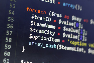 Web developer PHP code close up. Charging customer using Stripe API. Online payments processing. Abstract information technonology modern background. Concept screen of web developer.