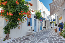 View Of A Typical Narrow Street In Old Town Of Parikia, Paros Island, Cyclades, Greece