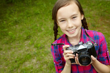 Teenage Girl With A Camera