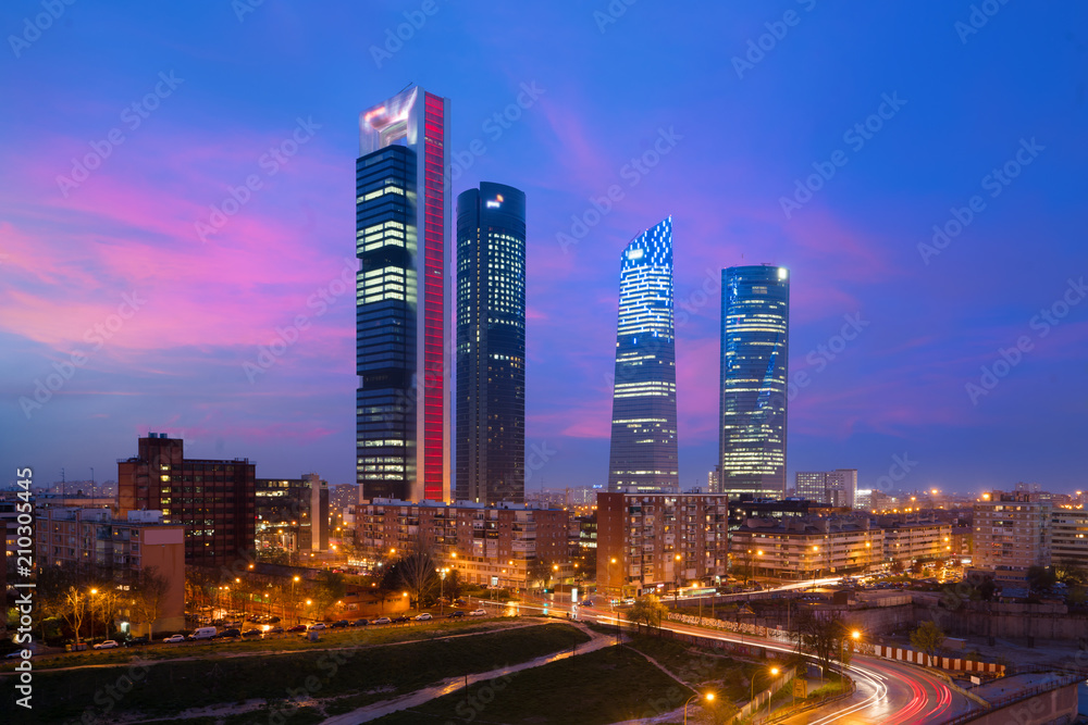 Obraz na płótnie Madrid Four Towers financial district skyline at twilight in Madrid, Spain. w salonie