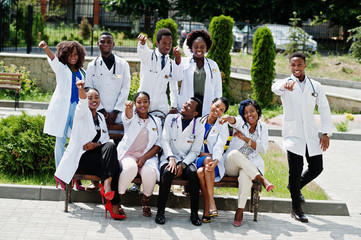 Wall Mural - Group of african doctors students near medical university outdoor.