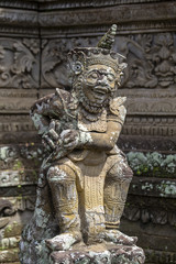 Wall Mural - Traditional stone sculpture in temple. Ubud, island Bali, Indonesia.