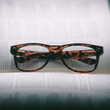 © Athichart - Glasses on open book vintage style