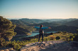 © Nejron Photo - Woman hiker on a top of a mountain