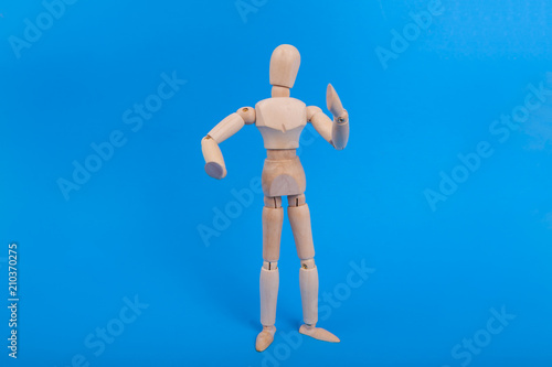 Fotografia, Obraz Wooden drawing figure tool for artiest on solid blue background