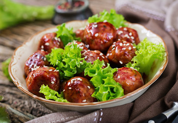 Meatballs with beef in sweet and sour sauce. Asian food.