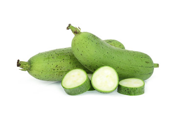 fresh green sponge gourd or luffa with slice isolated on white background