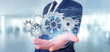 © Production Perig - Man holding a technology gear wheel interface3d rendering