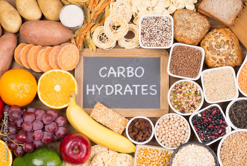 Fotografía Carbohydrates food sources, top view on a table
