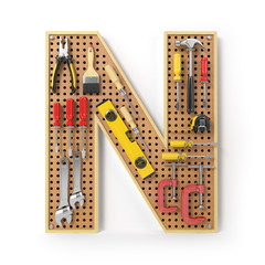 Letter N. Alphabet from the tools on the metal pegboard isolated on white.