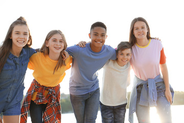 Wall Mural - Group of children outdoors on sunny day. Summer camp