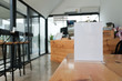 © 88studio - white label in cafe. display stand for acrylic tent card in coffee shop. mockup menu frame on table in restaurant. space for text
