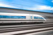 © Rumir - The high speed train rushes through the city by rail