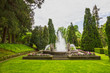Fountain in green park in Lombardy, Italy. Villa Taranto botanical garden