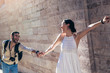© Mediteraneo - Traveling couple of tourists walking around old town. Vacation, summer, holiday, tourism: concept.