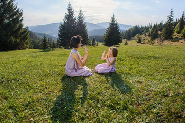 Poster - Mother and Daughter Playing on Meadow