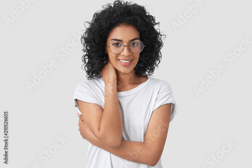 Horizontal Shot Of Shy Young Mixed Race Woman With Dark Skin