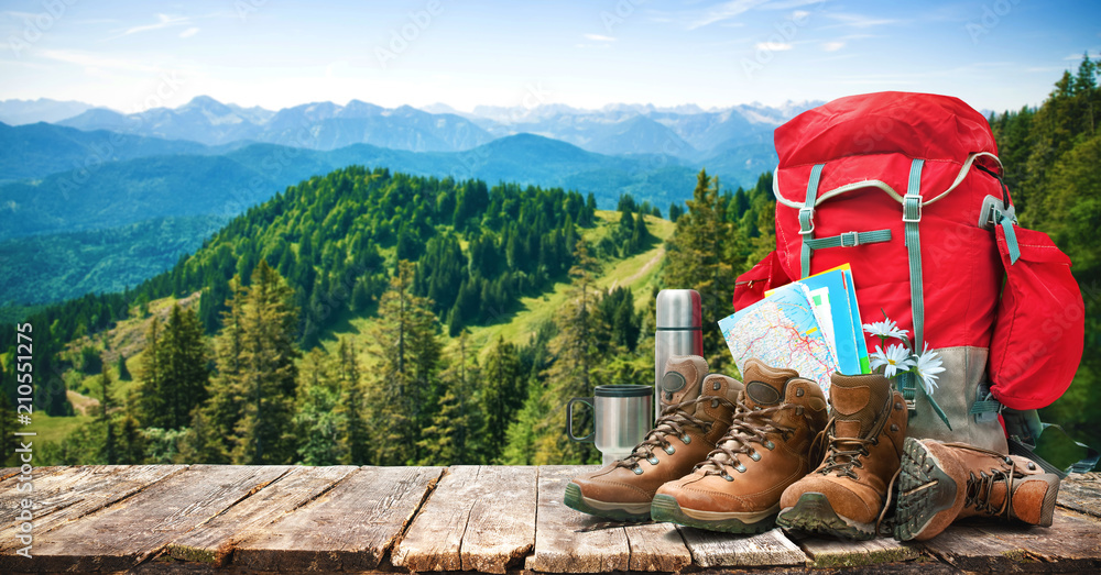 Big backpack and trekking boots - obrazy, fototapety, plakaty 