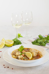 Canvas Print - Fish soup from cod fish and salmon with white wine.