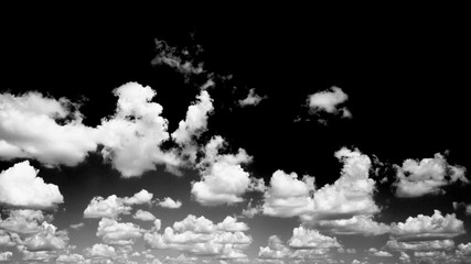 Wall Mural - cloudscape isolated on black sky, black and white cloudscape image