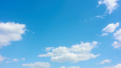 Wall Mural - Blue sky with white heap clouds - 4K timelapse