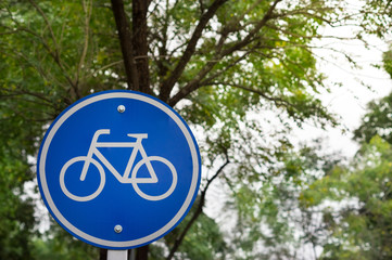 Bike lane sign on park.