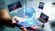 © Production Perig - View of a Businessman holding a Computer and devices displayed on a smartphone interface with international network  - 3d render