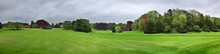 Panoramic View Of The Manicured Lawn And Immaculate Gardens And Trees Of The Royal Castle Of Laeken In Brussels Belgium