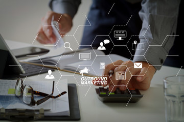 Poster - businessman hand working with finances about cost and calculator and latop with mobile phone on withe desk in modern office
