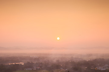  landscape view of sunrise above mountain with cloudy