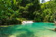 © Poramin.AR - Tad Kwang Si (Xi) the biggest water fall land mark in Luang Prabang, Laos ,beautiful turquoise color water at tropical forest in north Lao, for use as a background or travel advertisement image