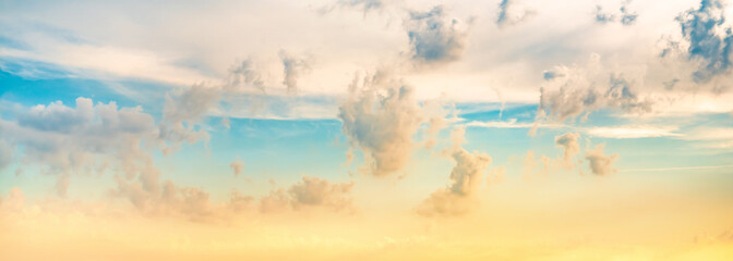 Wall Mural - Colorful sky with clouds as background