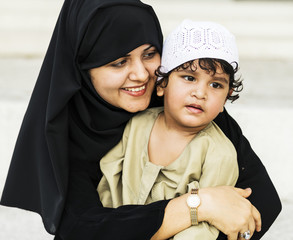 Wall Mural - Muslim mother and her son