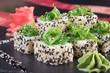 © Abramov Maksim - Японская кухня. Горячие и холодные закуски из морепродуктов. Суши и роллы и креветки. Японская еда и морепродукты в ресторане.