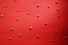 Fresh Green Peas Pattern On Red Background