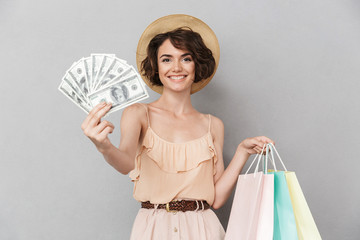 Poster - Portrait of an excited young woman in summer hat