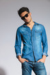 © Viorel Sima - cool casual man standing with hands in pockets
