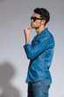© Viorel Sima - side view of ensive casual man with sunglasses