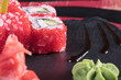 © Abramov Maksim - Японская кухня. Горячие и холодные закуски из морепродуктов. Суши и роллы и креветки. Японская еда и морепродукты в ресторане.