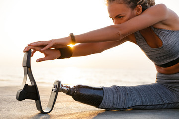 Wall Mural - Cropped image of disabled athlete woman