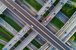 © themorningglory - Look down view of traffic cross intersection road with vehicle movement