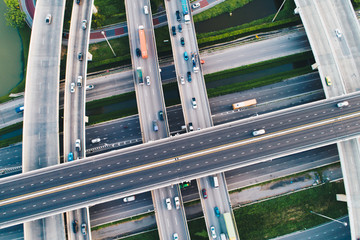 Look down view of traffic cross intersection road with vehicle movement